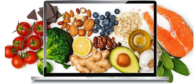 Pantalla de ordenador con fondo de alimentos saludables 